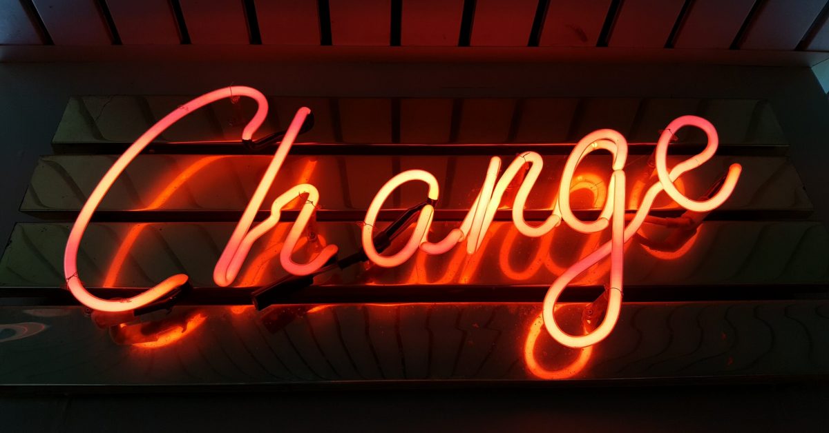 Neon sign that reads change